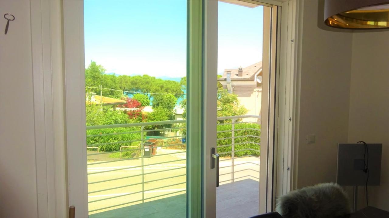 Holiday House Al Porto View Lake Пескьера-дель-Гарда Экстерьер фото